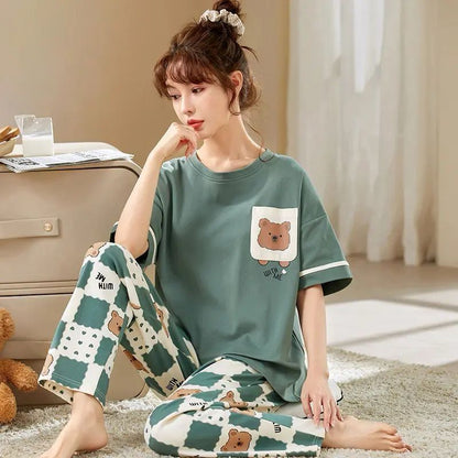 Women pajama set, ladies nightwear, purple pajama suit, cotton sleepwear, short sleeve top, printed pajama set, cute cartoon print, summer night suit, comfortable loungewear, two-piece nightwear, soft fabric sleepwear, girls home wear
